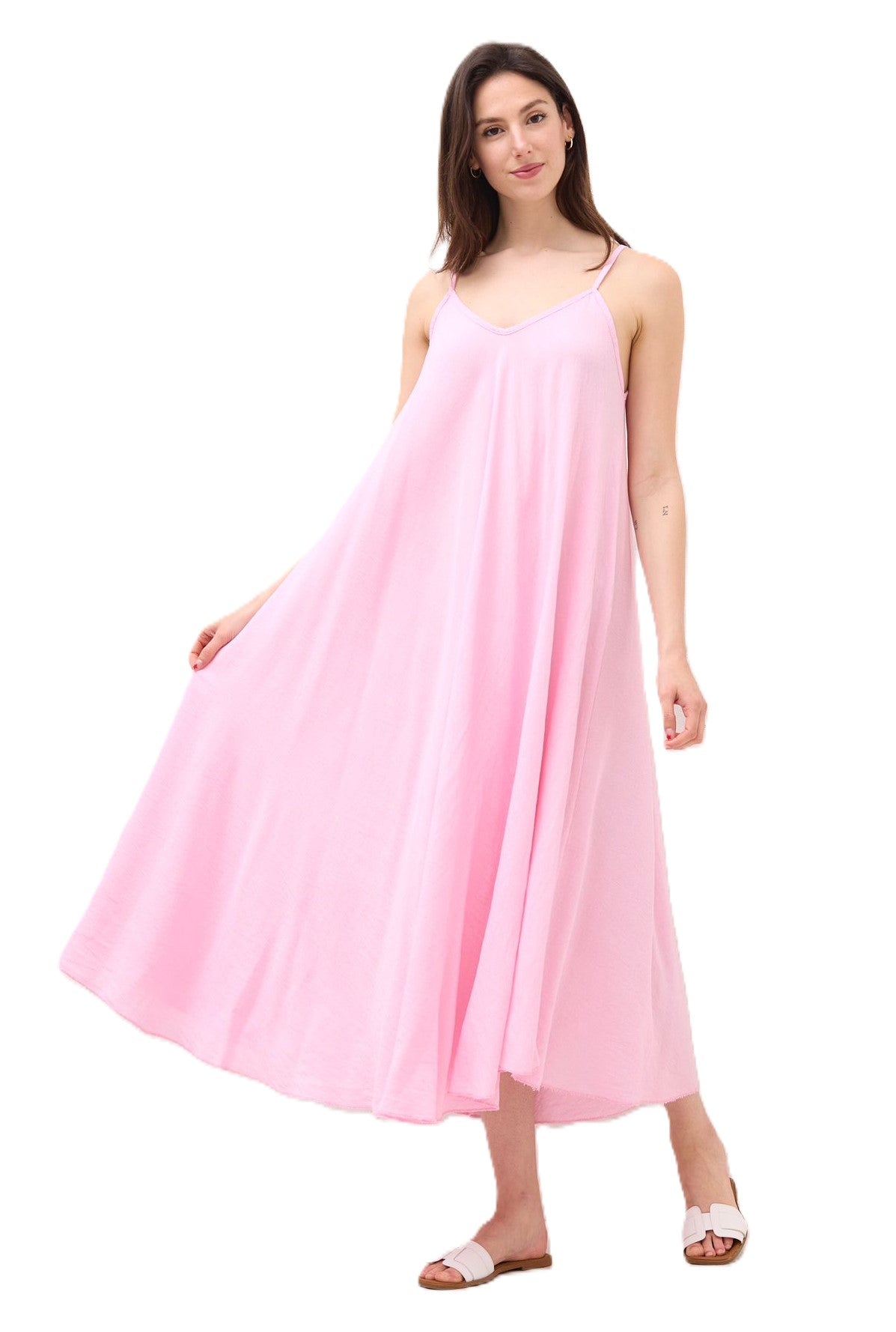 Woman wearing a pink dress on a white background