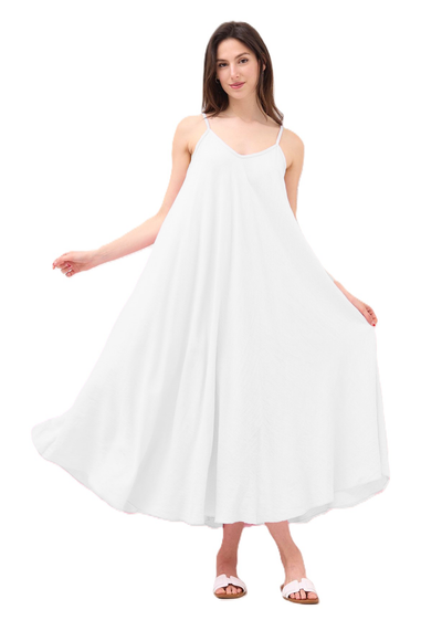 Woman wearing a white dress on a white background