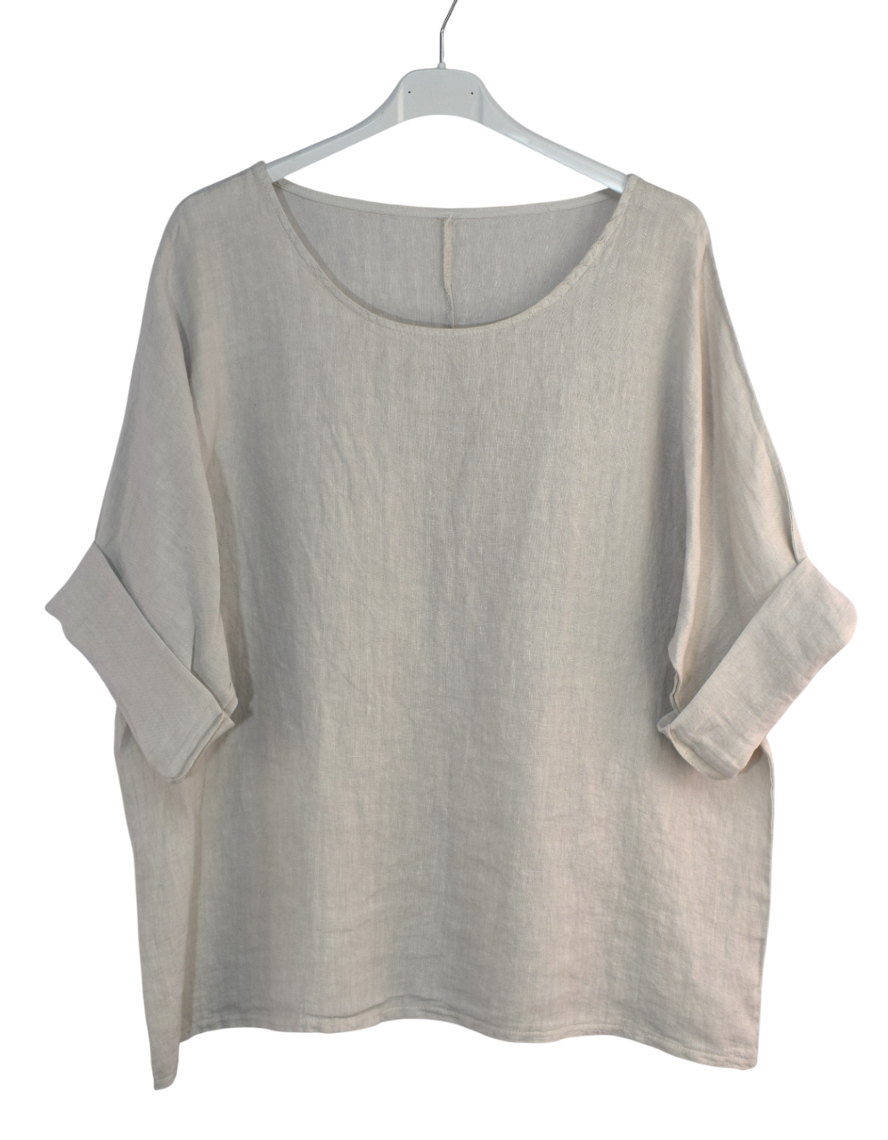 Beige oversized shirt on a hanger against a white background